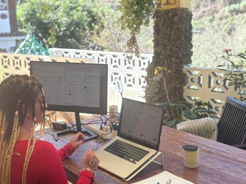 Guest doing remote work online at the terrace